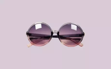 Sunglasses on pink background