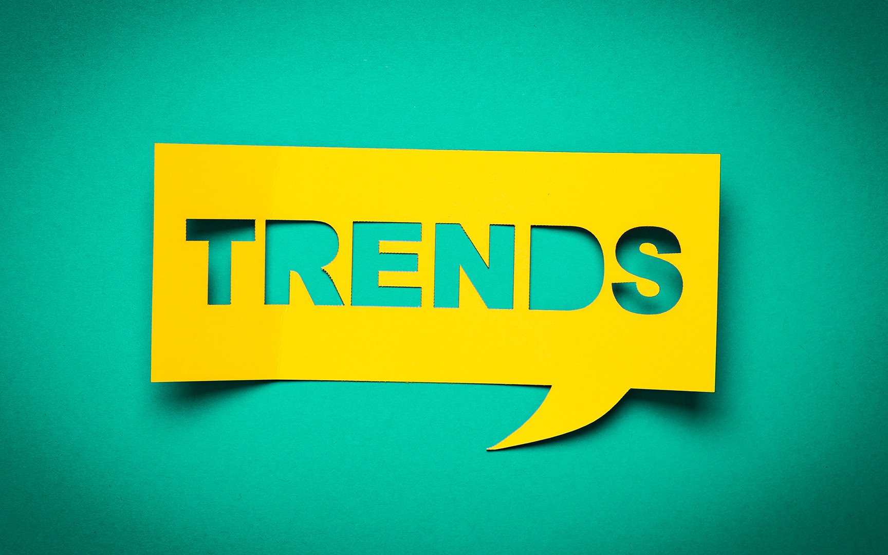 trends, yellow speech bubble, green background