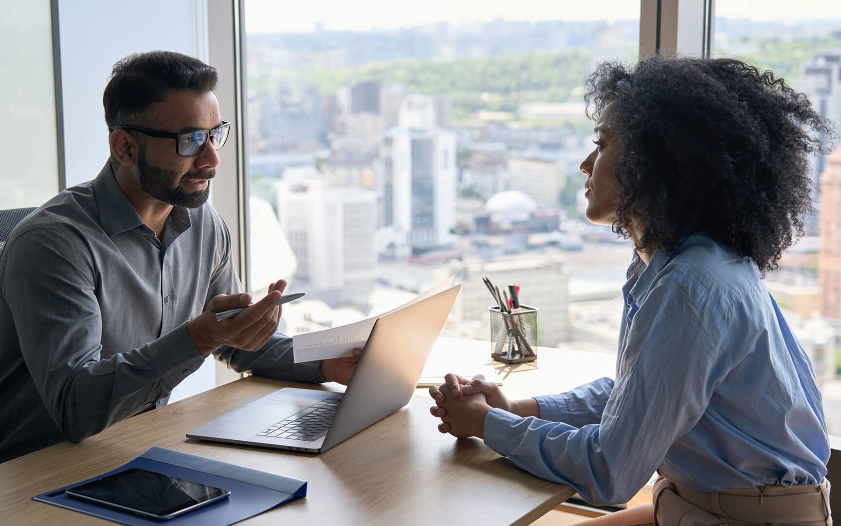 woman and men talking