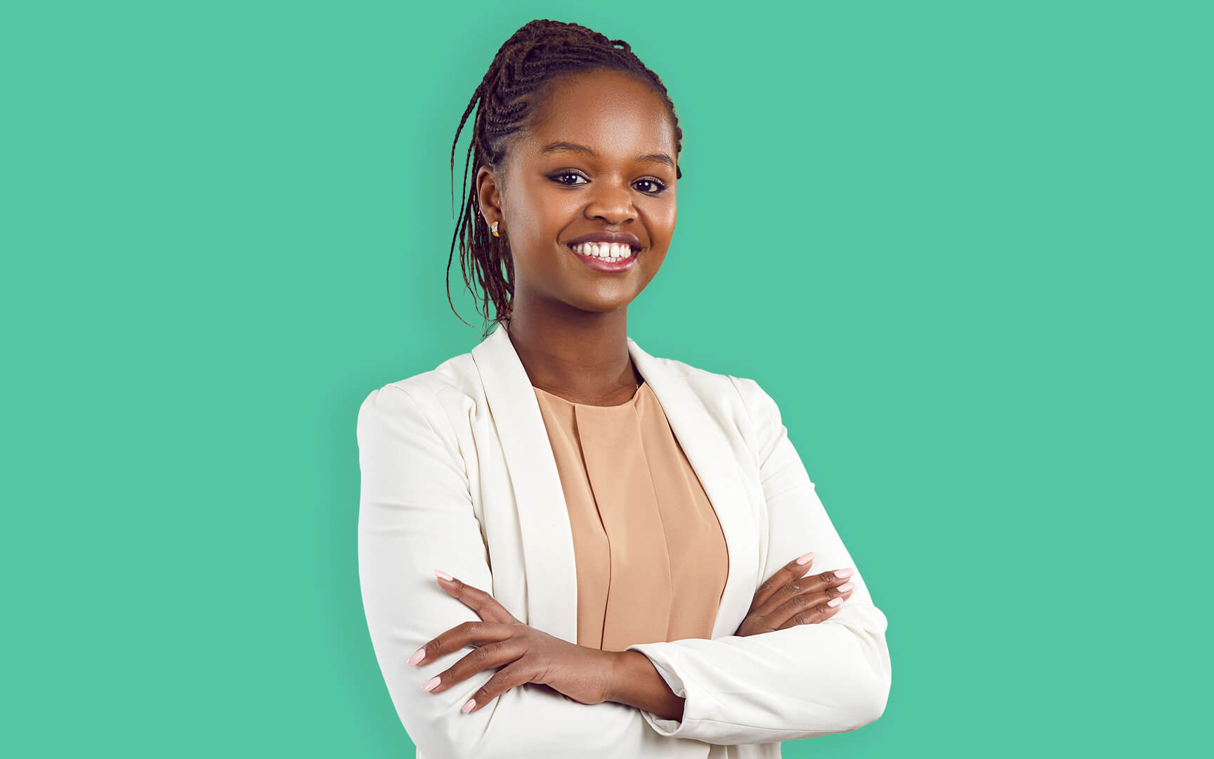 black woman smiling with green background