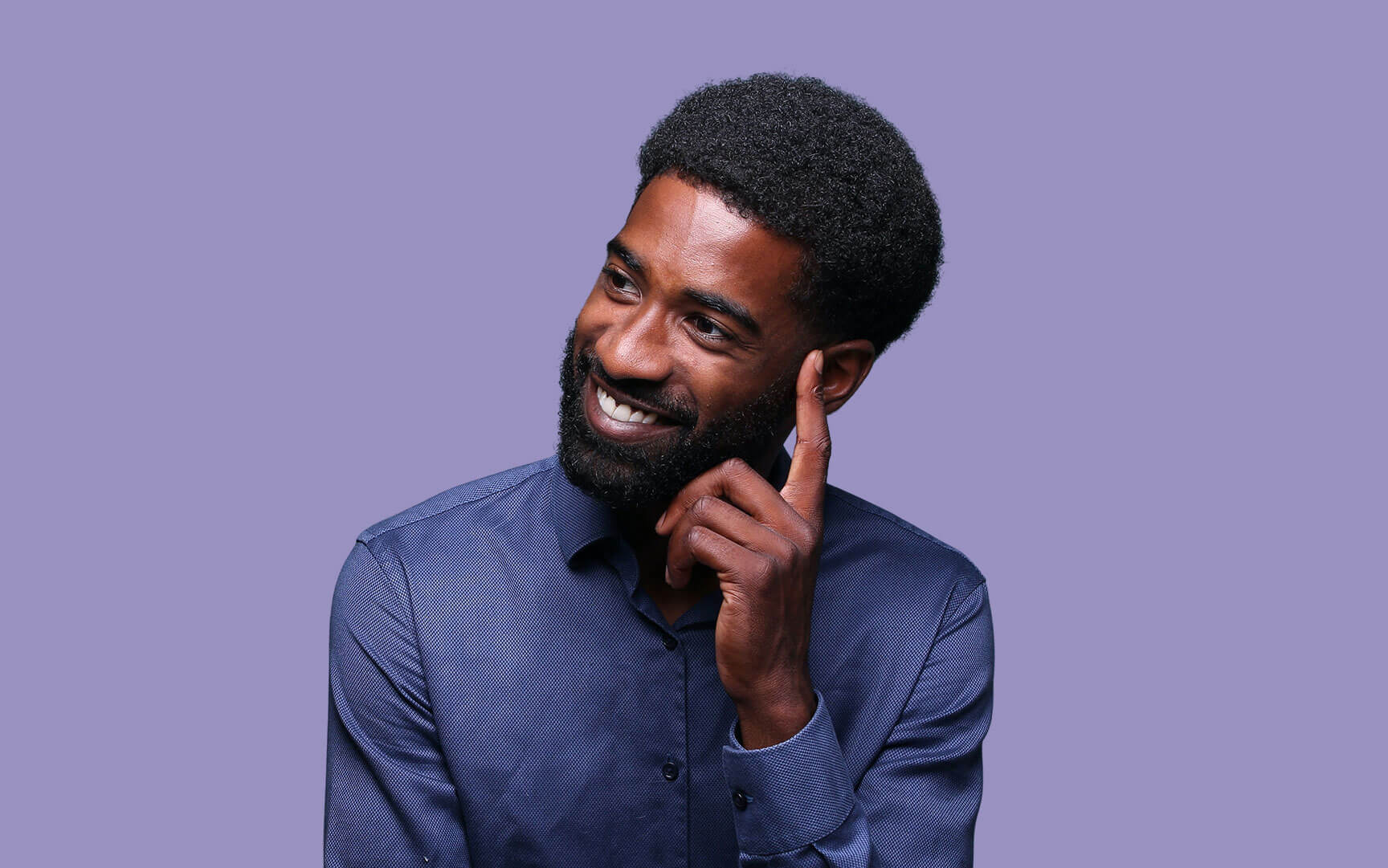 black men thinking with his hand in his head