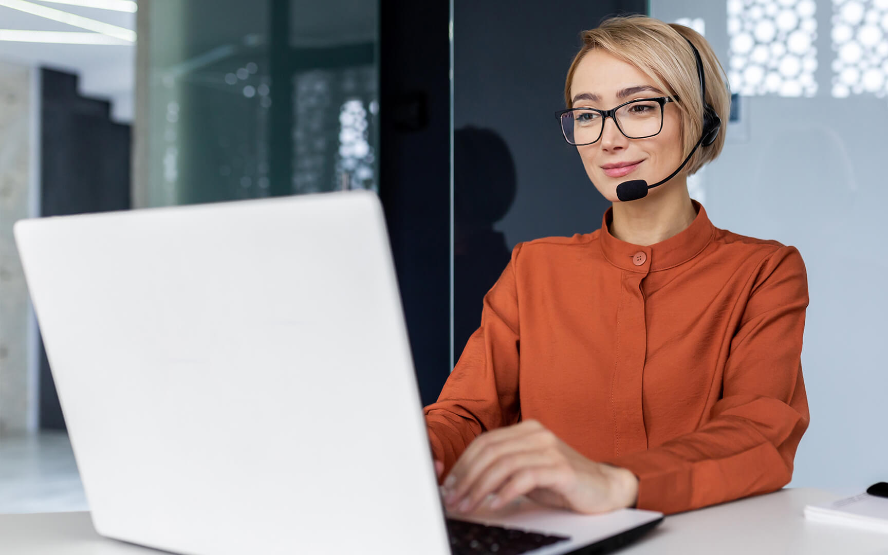 woman having a call with a laptop