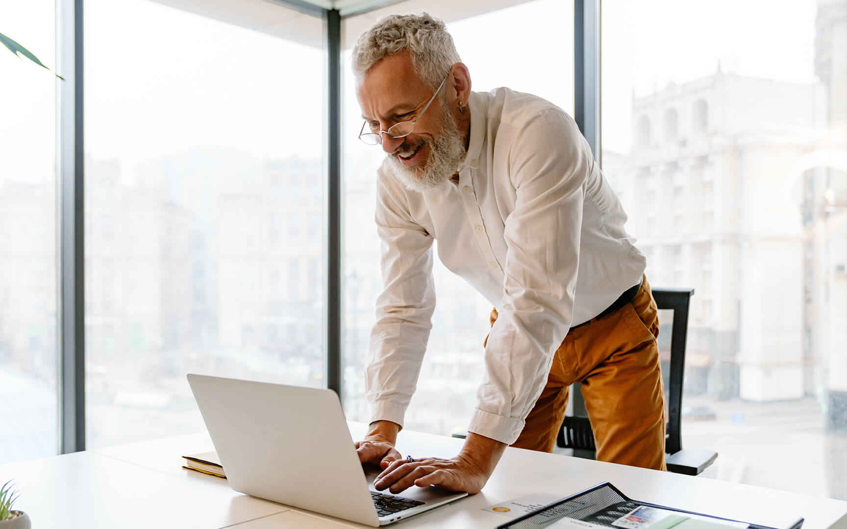 men in from of a laptop