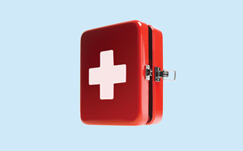 First aid kit on blue background