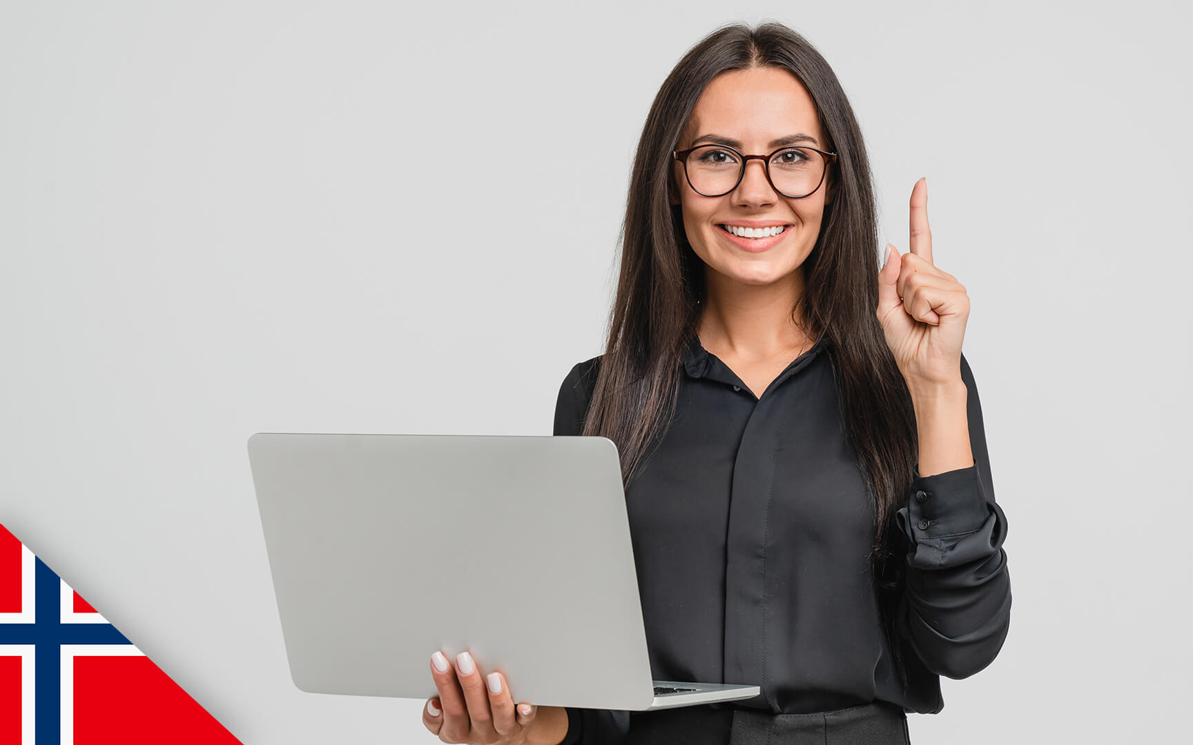 Woman with glasses holding laptop