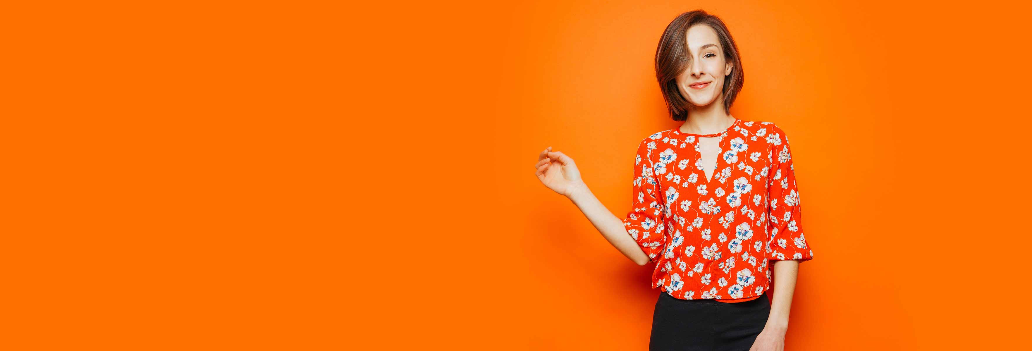 young girl in red shirt in orange background  banner image