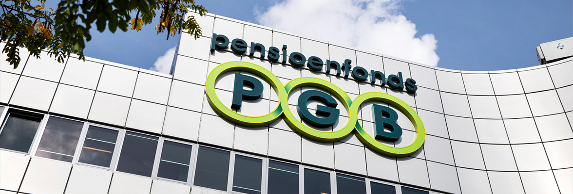 Exterior view of the PGB Pensioendiensten office building with the PGB logo prominently displayed on a modern glass and metal façade.