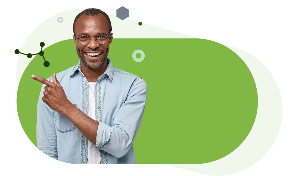 Smiling man with glasses on green background