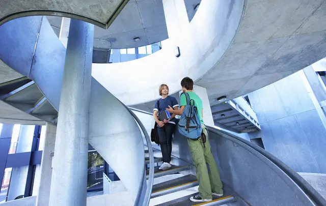 People talking on staircase 