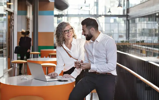 couple talking in a balcony