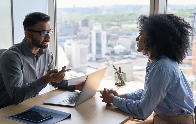 woman and men talking