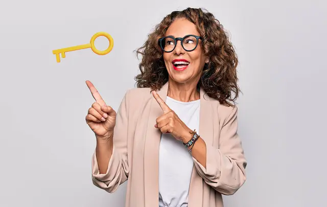 woman pointing to a key