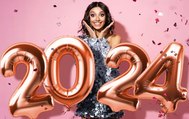 woman celebrating 2024 nye