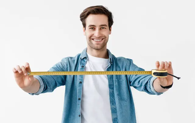 man with tape measure