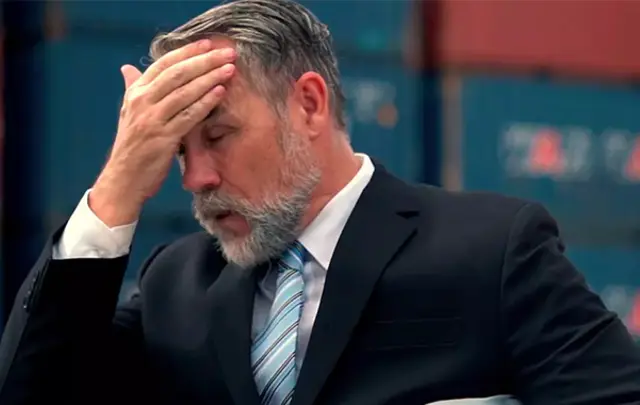 men with hand in his head