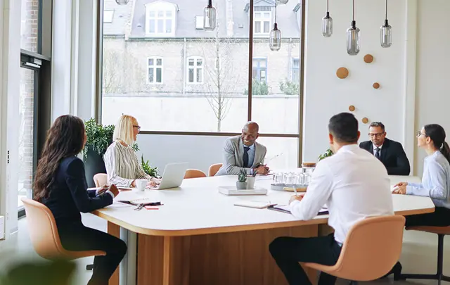 people sit in a meeting