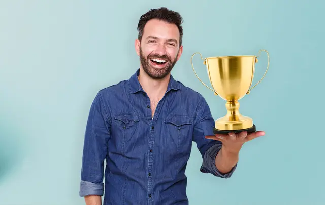 man with a cup in his hand