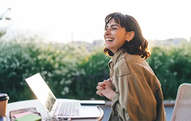 young woman with short hair smiling