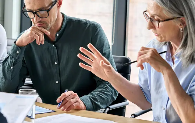woman and men having a meeting