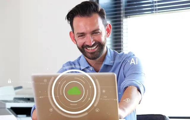 men smiling to the laptop