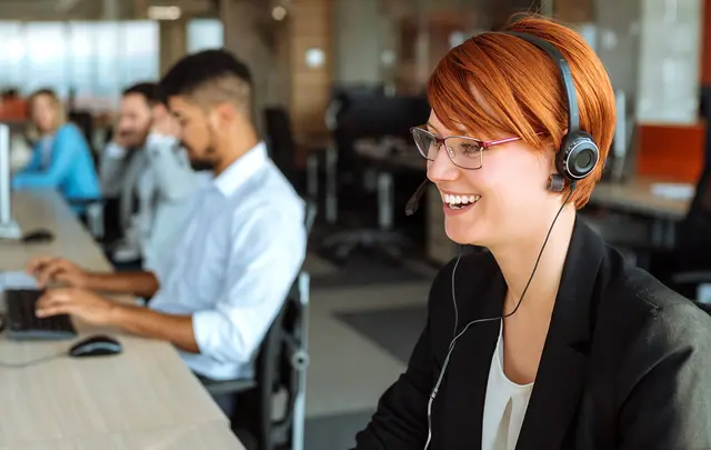 woman working and smiling