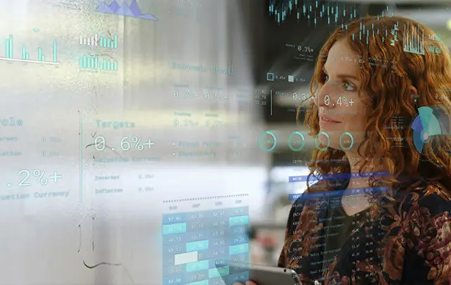 A woman holding a smartphone stands on the right, overlaid with transparent economic data visualizations, including bar graphs, line graphs, and pie charts in blue and green. 