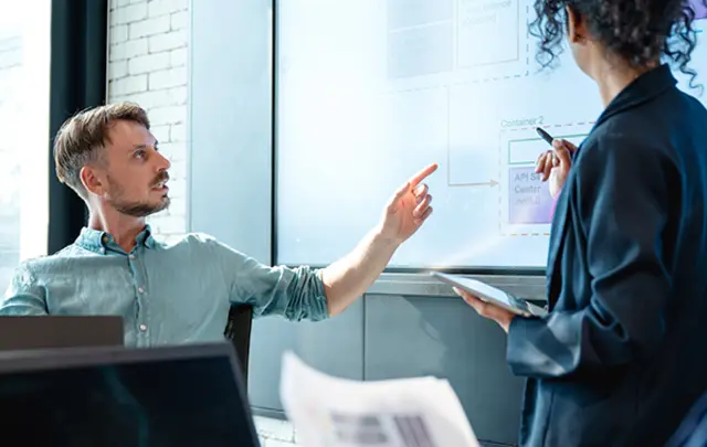 A collaborative business meeting in a modern office.
