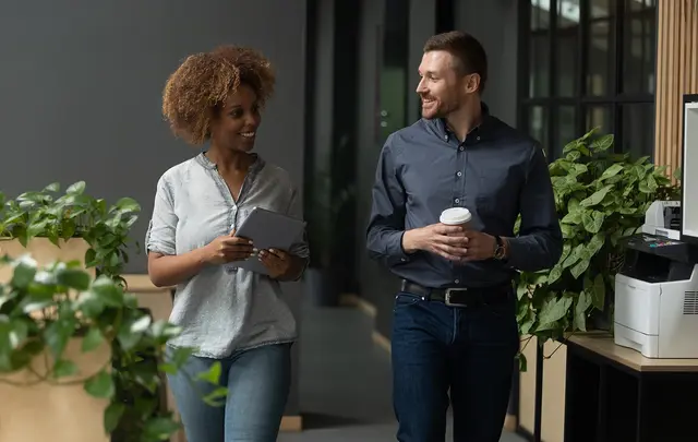 two people talking in a business setting