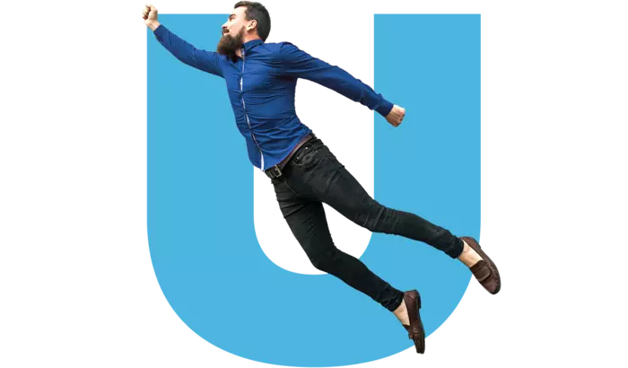 A man in a blue shirt flying to the cloud with a U as background