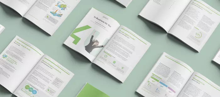 Brochures on green background