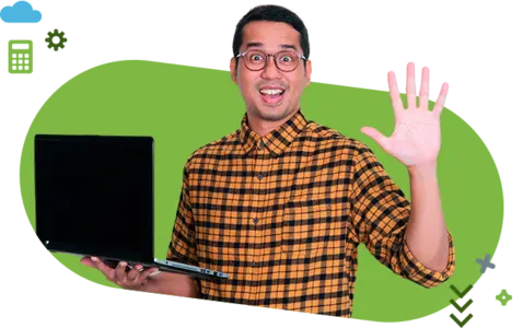 A smiling man in a plaid shirt holds a laptop and waves hello