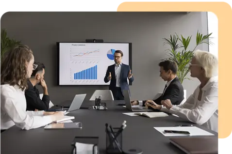 A professional business meeting in a modern conference room.