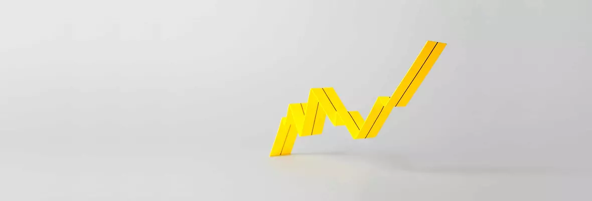 a 3 dimensional bar chart in yellow showing a steady increase on a grey background