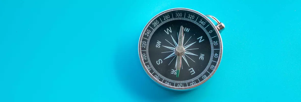 compass guiding people