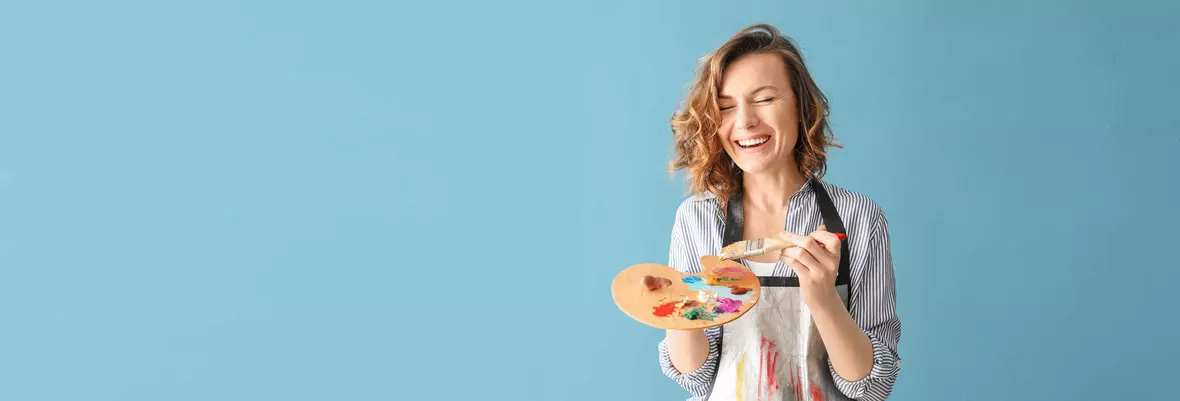 woman holding painting plate