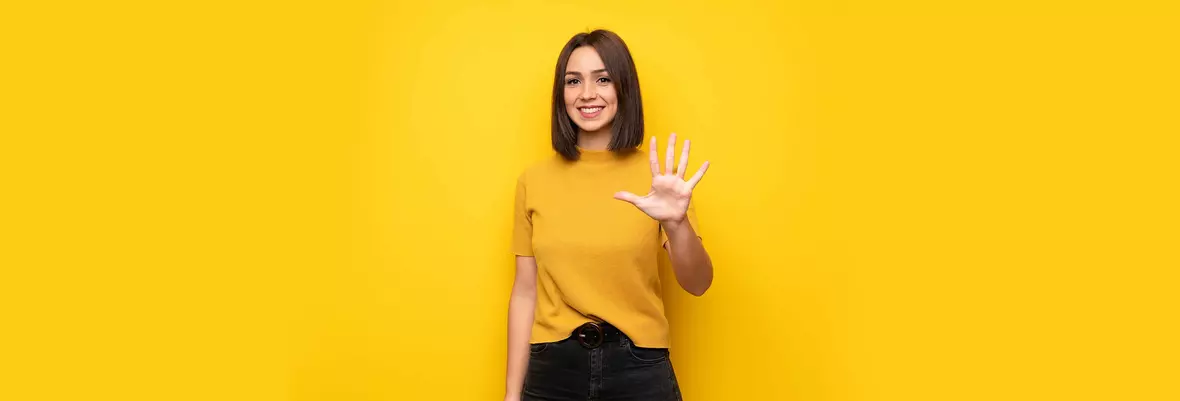 Young woman holding out her hand to represent 5 things