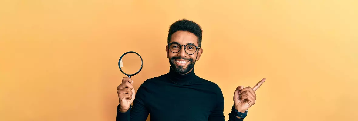 person with magnifying glass