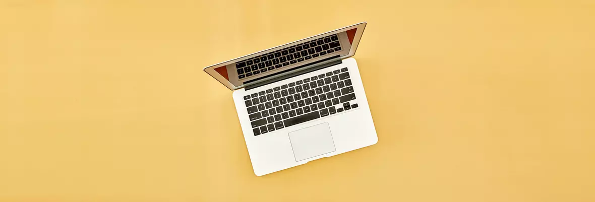 laptop on orange background