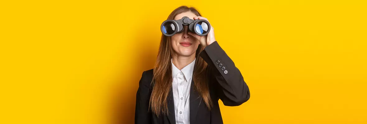 person with binoculars