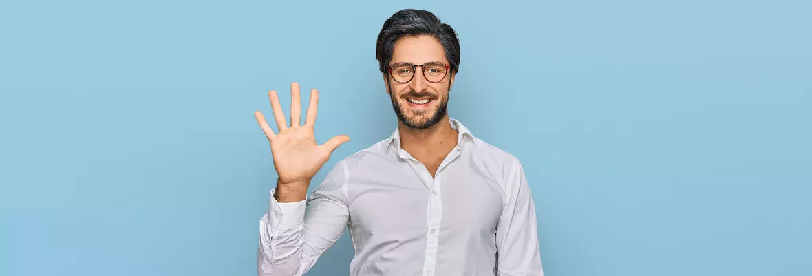 man with glasses waving