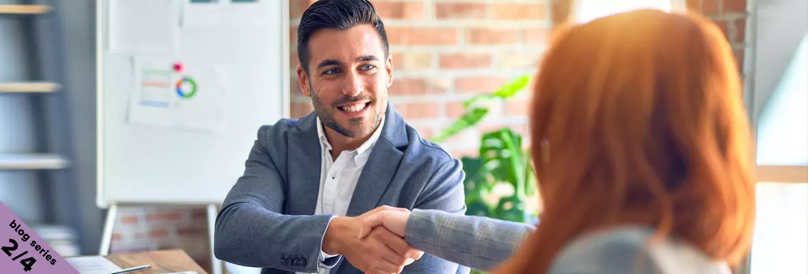 business men and woman shaking hands