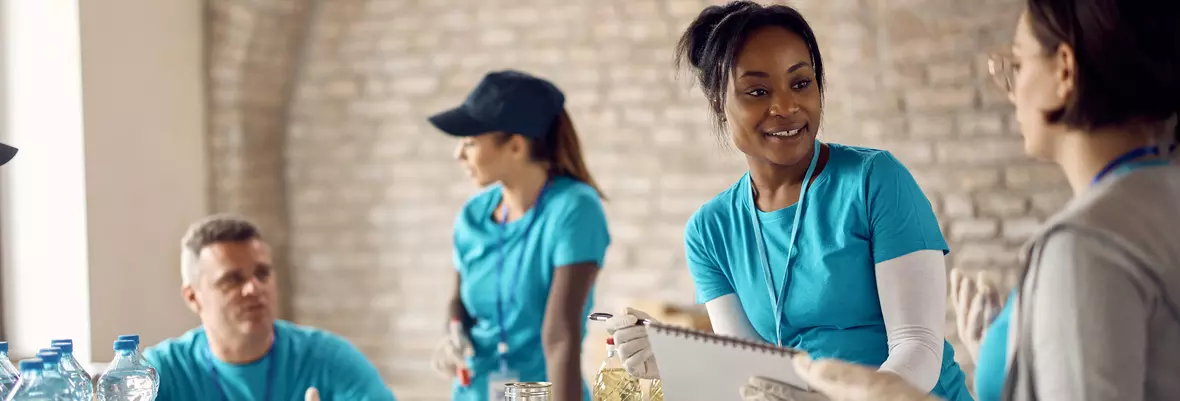 people working going through donations