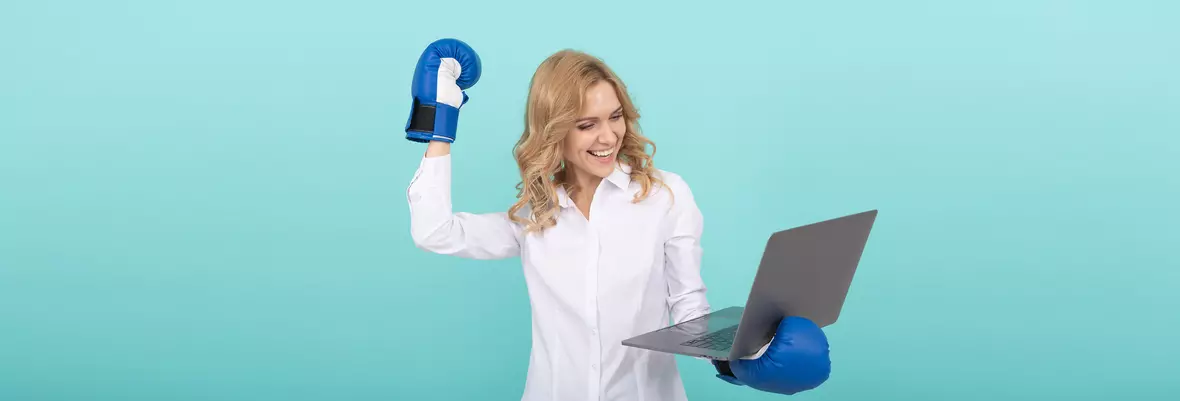 Woman with laptop and box gloves