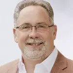 photo of Chris Bayne,  CEO, The Access Group