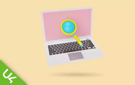 Laptop and magnifying glass