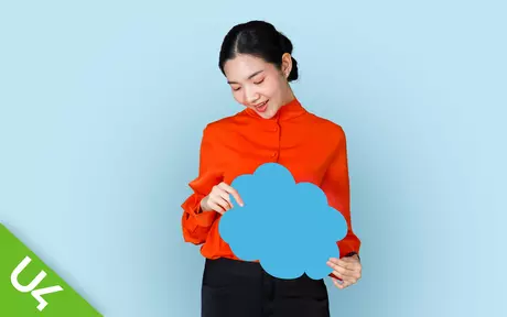 Woman holding a blue cloud