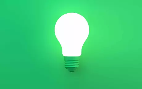 lightbulb on green background