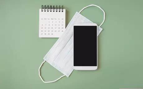 mask with phone and calendar