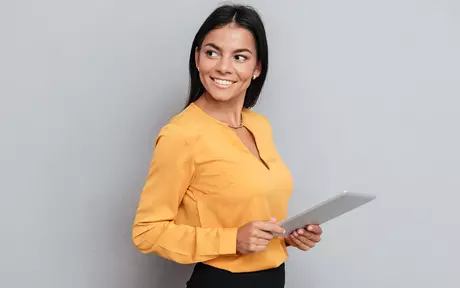 Business woman wearing yellow shirt