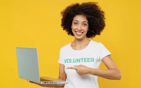 volunteer with laptop